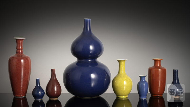 A group of nine monochrome glazed porcelain vases, partly marked